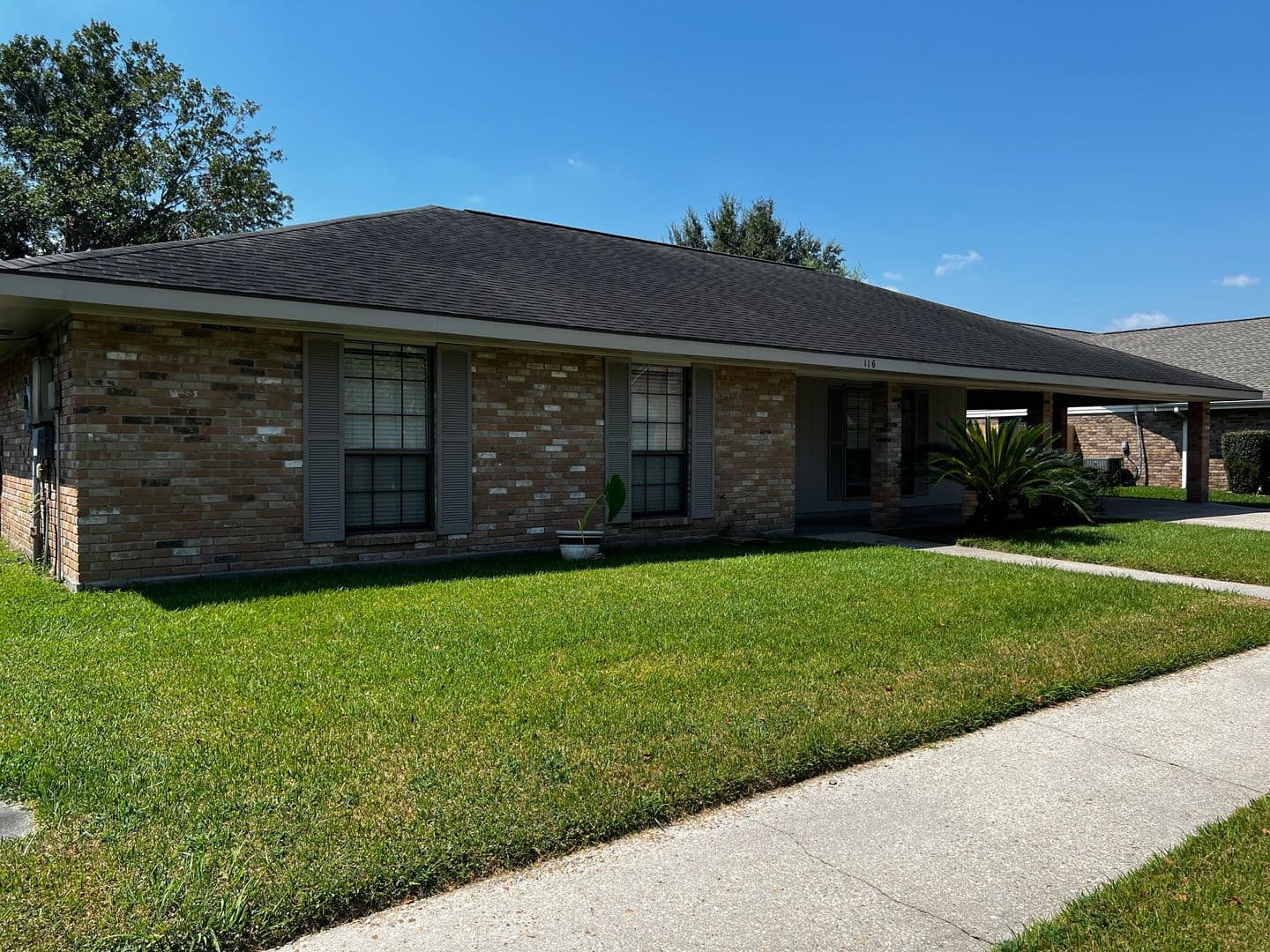 4 Bedroom, 2 Bathroom, large yard, 2 car carport, NEW floors and paint.